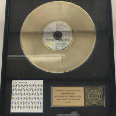 A framed and glazed limited edition gold disc and CD display in recognition for worldwide sales of the Every Breath You Take album by The Police. Number 18/50. Approx 53cm x 43cm.