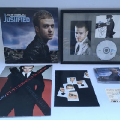 A collection of Justin Timberlake items comprising a signed CD cover, concert program, ticket stub, 'Justified' 2LP etc.