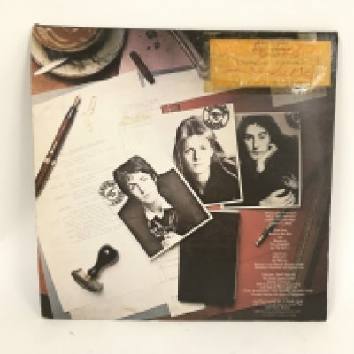 A copy of 'Band On The Run' by Wings with Paul and Linda McCartney's autographs attached to the reverse. Provenance from the vendor as follows. I was at school at Appleton in Benfleet and Mr Hammond our drama teacher took my class on a school trip to Jesus Christ Superstar at the Palace theatre It was my first school trip and my first visit to a London musical. I think it was in 1973 at the start of the Autumn term In the theatre and one of the actors was replaced by an understudy and a paper slip was put in the programme. In the interval we all went up to the bar and I spied Paul and Linda sitting at a table enjoying a drink I went across and asked if they were Paul and Linda McCartney and if they were could I have an autograph. None of the rest of my group noticed who they were and actually no one else was bothering them. They were incredibly kind and they sat me down, bought me a lemonade and found the slip in my programme which they both signed. Paul told me all about his new band that he had called Wings and that in a few months there would be an album out called Band on the Run. Linda told me that is was very healthy to be Vegetarian and that she never ate meat. Paul was dressed in a very smart pale blue suit and Linda was in a Kaftan in more muted shades. They were incredibly nice kind and polite to me. The album came out in the December and I bought it immediately. I loved it and I stuck the autographs to it and that's where they have been ever since. I never did like like Linda's veggie sausages though which I also dutifully tried when they came out many years later.