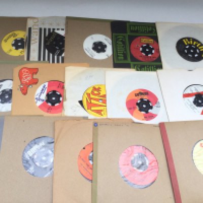 A box of soul, funk and reggae 7" singles by various artists including James Brown, Ike and Tina Turner, Upsetters and many more. Includes some demo discs.