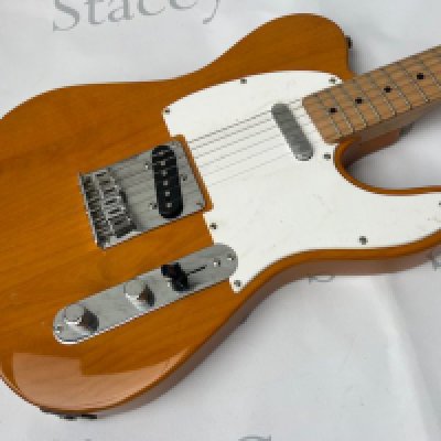 Squier Telecaster solid body electric guitar - made in China Natural finish with chrome parts. In good to very good condition. Very little evidence of any playwear. No marks, damage or foreswear.