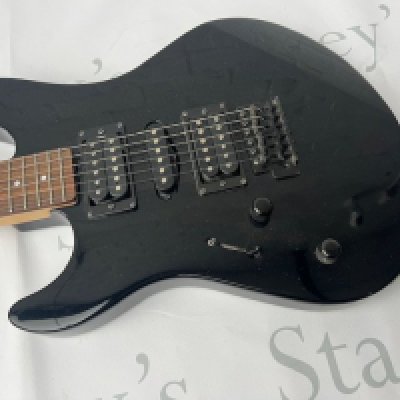 A Yamaha RGX 121 left handed electric guitar in black with black chrome parts. Good overall condition with some playwear and marks to back. No case