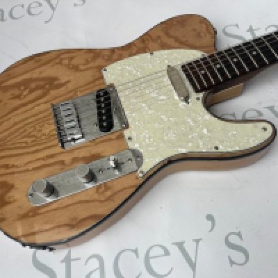 A scratch built quality T Style Guitar built from quality parts including machine engraved tailpiece and control plate. Very good condition with light fret wear - no case.