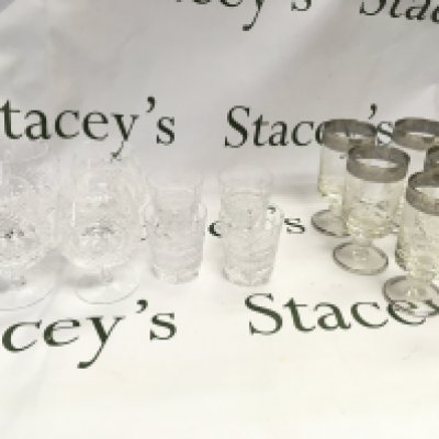 A collection of assorted glasses including 8 Waterford crystal glasses. Postage D
