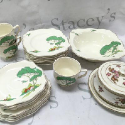A Clarice cliff Snow White style tea set including saucers , cups, bowl dish and a Crown Devon jar. This lot cannot be posted