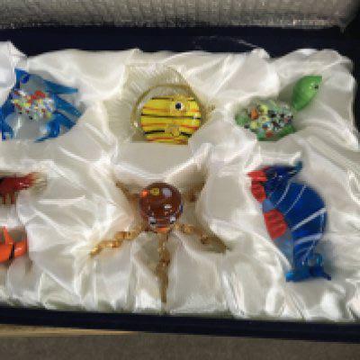A Collection of seven glass murano animal figures In original box .