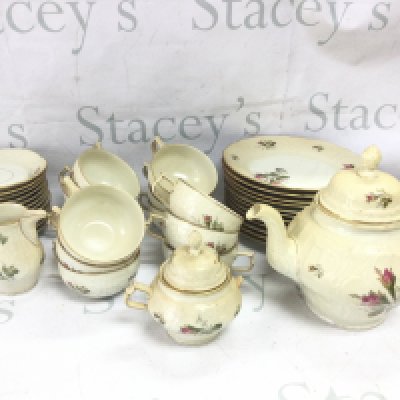 A classic rose Rosenthal tea set including saucers, cups , plates, teapot etc. this lot cannot be posted