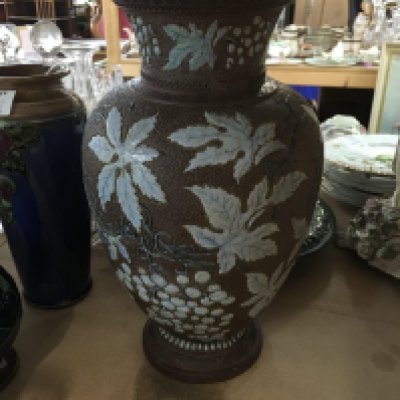 A Doulton vase decorated with grapevine.33 cm.