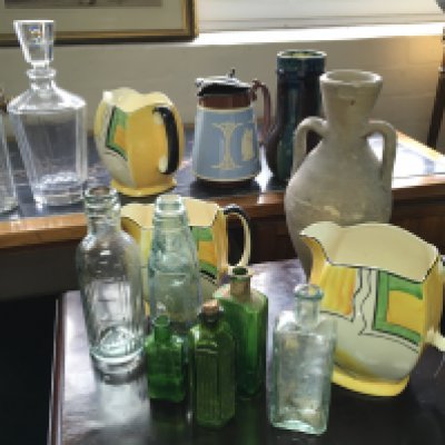 A Collection of ceramics including glass bottles,