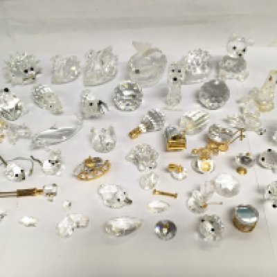A collection of Swarovski ornaments. Shipping category D.