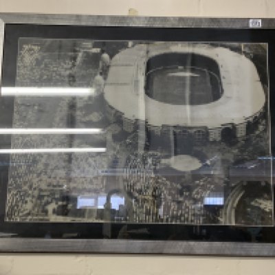 A large framed photo of Wembley Stadium c.1970s (some damage) .98cm x 76cm- NO RESERVE