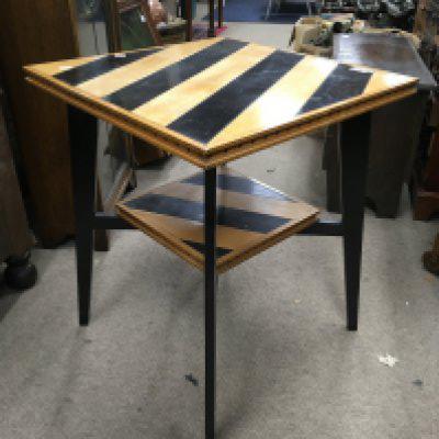An Art Deco occasional table, the rectangular striped top above square tapering legs, United by an under tier. Attributed to Charles Dudouyt. 62cm x 53cm