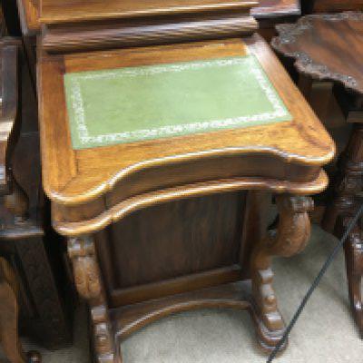 A reproduction davenport. Shipping category D.