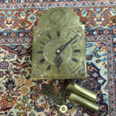 A German brass dial wall clock . Postage catb