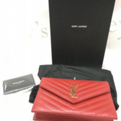A boxed Saint Laurent Red Grain De Powder Matelasse wallet on chain bag with certificate, receipt and dust bag