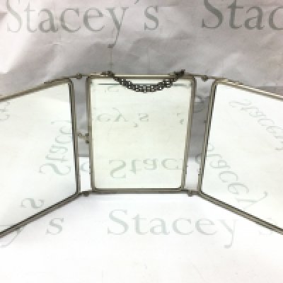 A good vintage three mirror carrying mirror with chain, handle and embossed flower covers. Each panel 18x24cm This lot cannot be posted.NO RESERVE