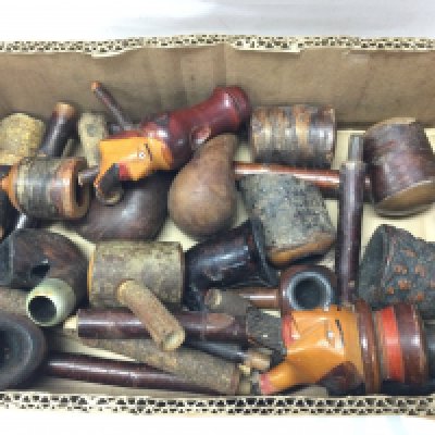 A box of old smoking pipe parts, stems and bowls . Postage category B. NO RESERVE