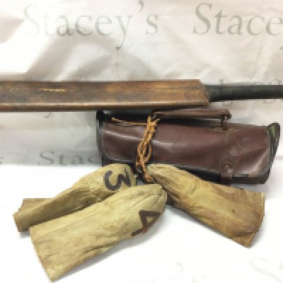 A set of three vintage bowls in leather case, cricket bat and a set of three very early leather golf club heads covers no 2,3,4 .this lot cannot be posted. NO RESERVE