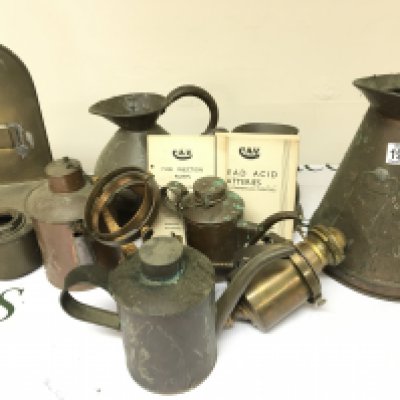 A Collection of Antique copper and brass including measuring jugs oil lamp on a gimbal small cans Vintage CAV car service manuals and a box of glass oil lamp shades.- NO RESERVE