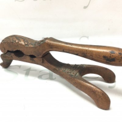 An unusual Victorian heavy metal nut cracker by Bard and Tatlock London, 24cm long. Postage category B. NO RESERVE