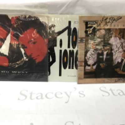 Three signed records, including Tom jones, go west and five star.