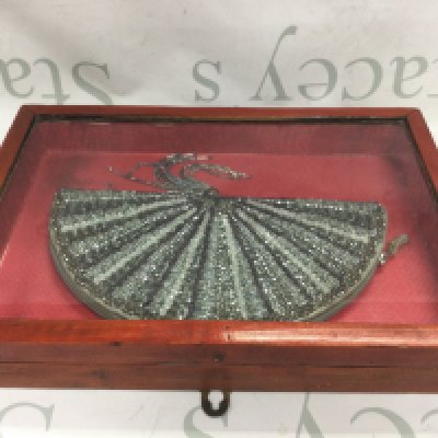 An unusual small handbag in a display case . 33cm long This lot cannot be posted