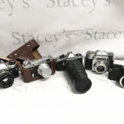 Five vintage SLR cameras including an Olympus, Pentax, Agfa, Rare Russian FED 2 . Postage category c