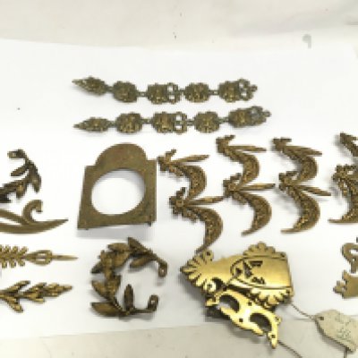 A lot of furniture and clock bronze fittings . Postage category A