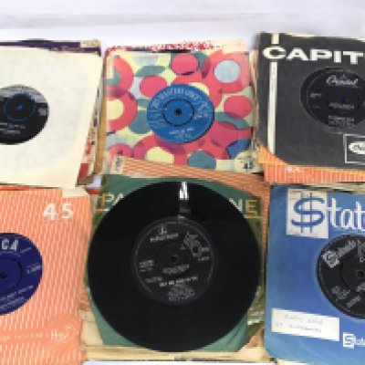 A small collection of 1960s 7" singles and EPs by various artists including Johnny Kidd, The Supremes and others.