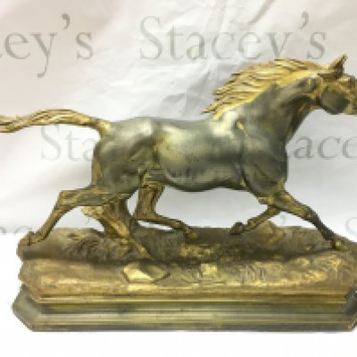 A Jules Moigniez spelter gilted horse, 48cm wide . This lot cannot be posted