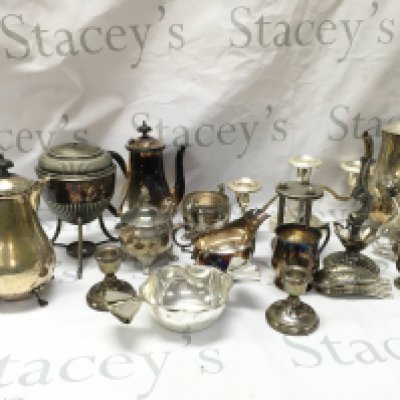 A Collection of silver plated items including jugs, candlesticks , cups , silver hallmarked collared oil and vinegar bottle etc . This lot cannot be posted