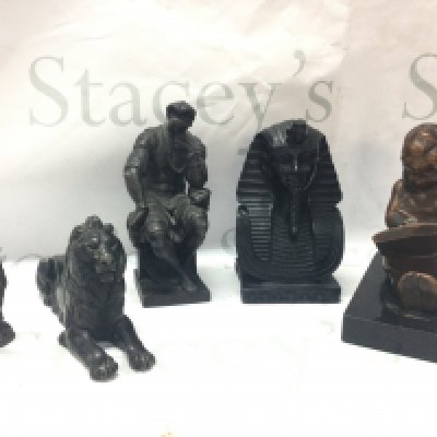 A Tutankhamen bust, lion figure, child reading book , Lorenzo di Piero de Medici figure, bronze figures desk seals. Postage category C