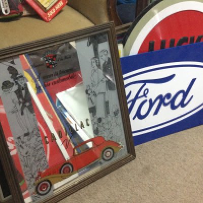 A collection of vintage advertising signs including advertising mirrors Cadillac , Pepsi cola Starsky and hutch , Chesterfield cigarettes, Cola Cola, Lucky Strike metal sign etc. this lot cannot be posted