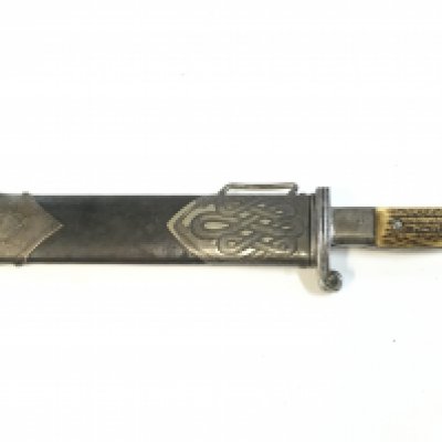 A German WW2 Rad Hewer maker Boker , initialled on handle J.C. Blade 24cm long , total length 38cm approximately. This lot cannot be posted