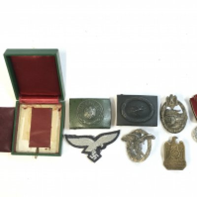 Two German belt buckles , Luftwaffe officers breast buckle eagle, NSDAP badge and entry medal , Spanish cross box , Luftwaffe observers badge and panzer tank badge . Postage category A