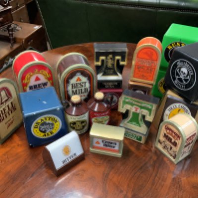 A collection of small vintage bar tap lights.