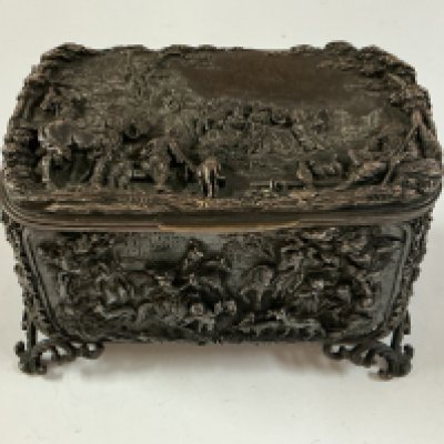A 19th Century French silvered copper trinket box with repouse panel decoration. 13.5cm x 8cm x 9cm.