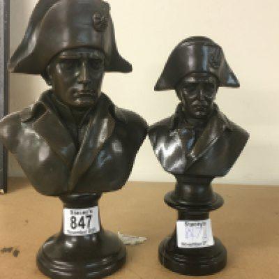 Two bronzed busts in the form of Napoleon.