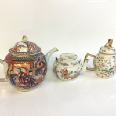Chinese tea pots including Famille Rose from 9cm to 16.5Cm tall. This lot cannot be posted