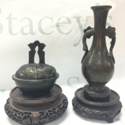 An unusual Bronze Chinese foldable candlestick with a six character mark to base and a bronze Japanese flower vase . 9 and 15cm tall. Postage category B