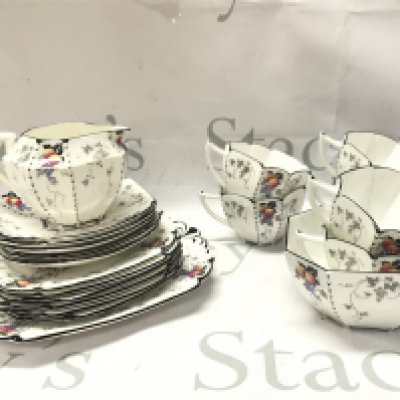 Shelley art deco Queen Anne Peaches and Grapes pattern tea set including saucers and cups. This lot cannot be posted