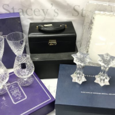 Boxed crystal class including Edinburgh crystal glasses, Tipperary crystal candlesticks, boxed as new leather covered jewellery box, marouisby Waterford glass photo frame . This lot cannot be posted