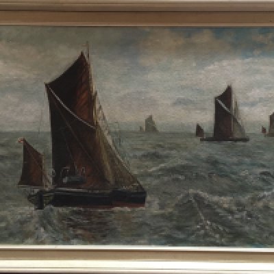 An Oil on board painting of Thames Barges signed I.Moise.