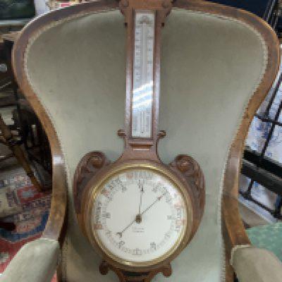 A Collins of Ipswich oak barometer. 74cm.