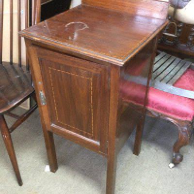 An inlaid mahogany pot cupboard. Shipping category D.- NO RESERVE