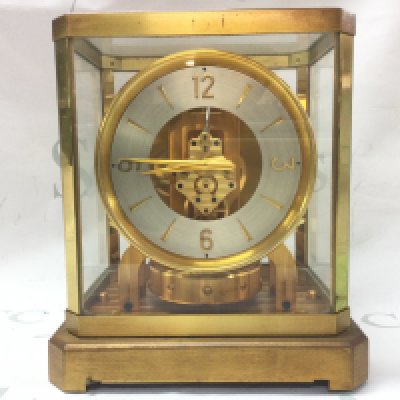 A Jager Le Coultre Atmos mantle Clock, gilt brass and glass cased. Dimensions 16x21x24cm .Seen working. This lot cannot be posted