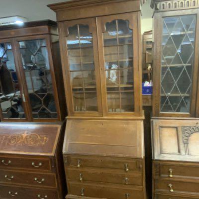 An oak bureau bookcase with glazed doors. 209cm x 84