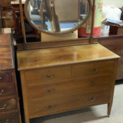 An Edwardian mirror backed dressing table.