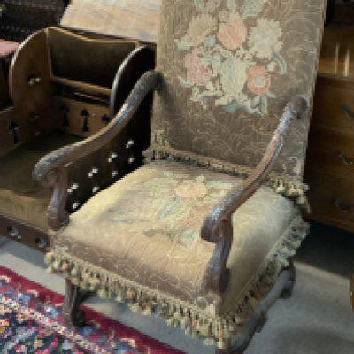 A French upholstered open armchair. 63cm x 116cm.