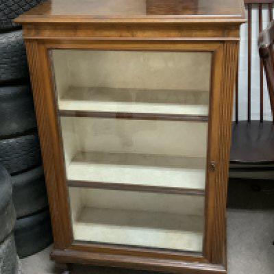 A Victorian walnut glazed pier cabinet.69cm x 106cm x 36.5cm